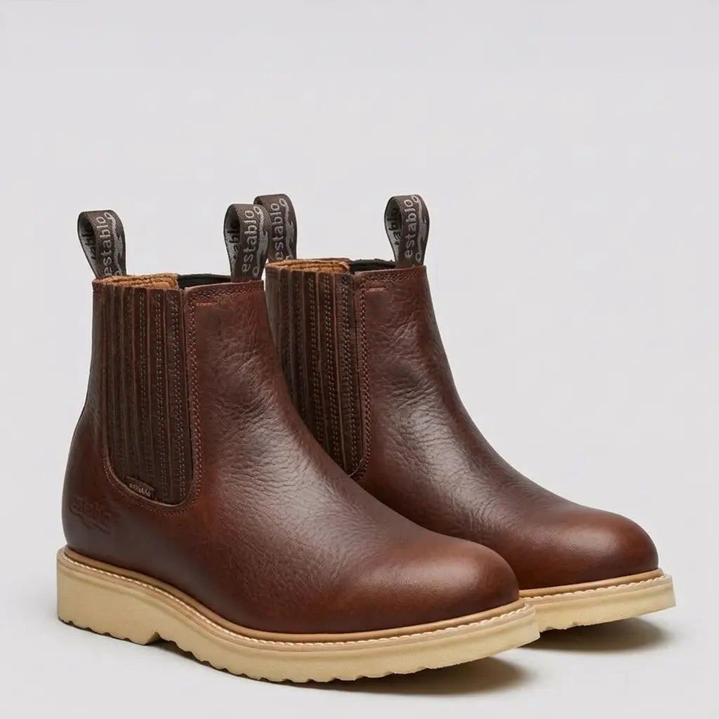 Studio pair view of the Establo Men's honey brown pull-on wedge work boots shown from a three-quarter perspective.