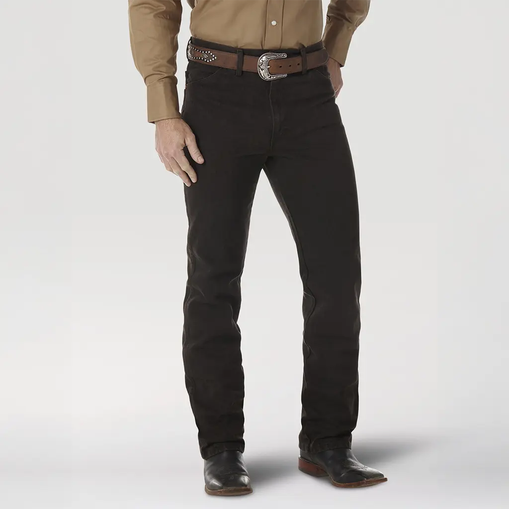 Front close-up studio view of the Wrangler Men's 0936KCL Black Chocolate jeans showing the high waistband, leather belt, and rich dark brown color.