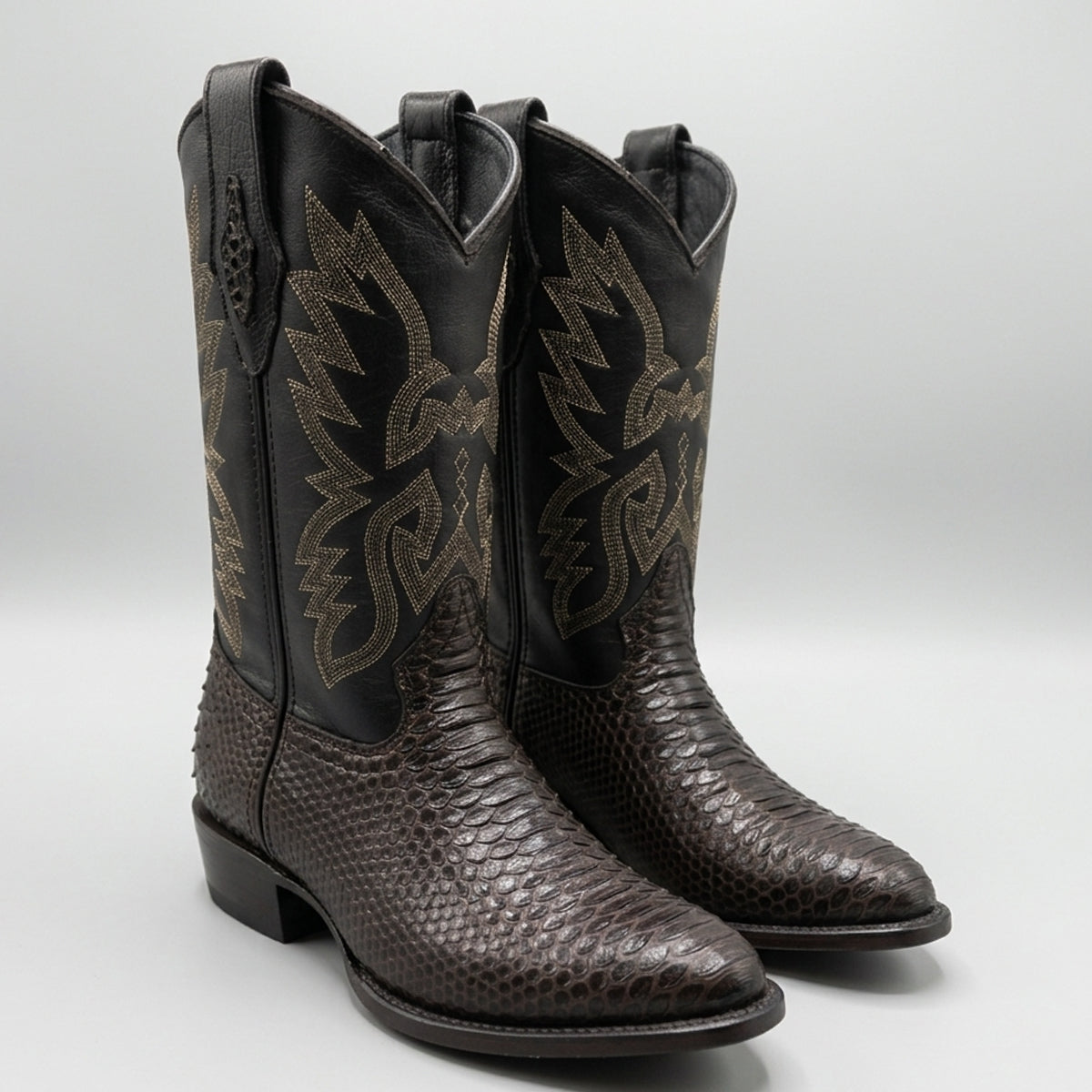 La Sierra Men's brown python print leather cowboy boots with a tapered J-Toe profile, 12-inch embroidered shaft, and cowboy heel.
