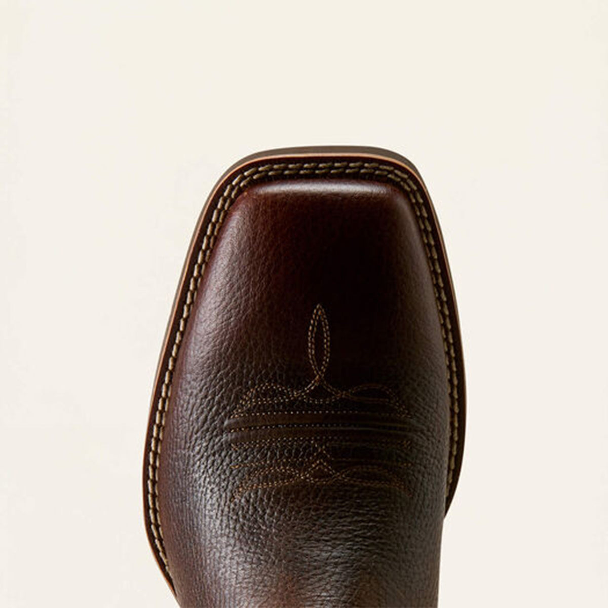 Close-up of a Ariat brown leather square toe.
