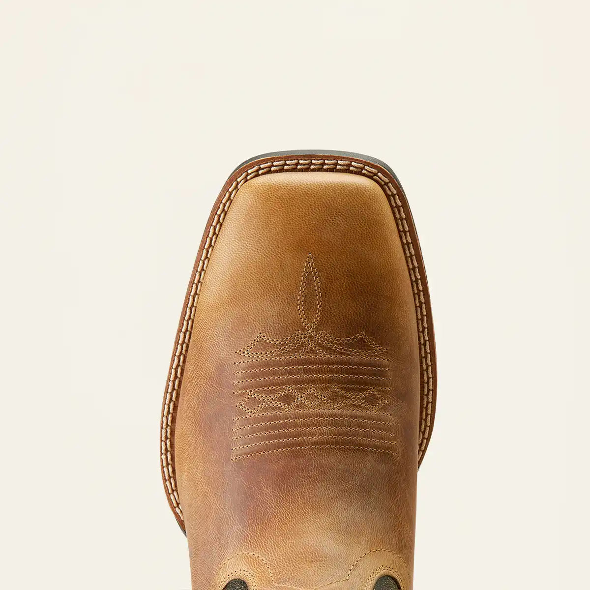 Top-down toe view of the Ariat Men's Sport Riggin Western boots in tan full-grain leather with dark green embroidered shaft.