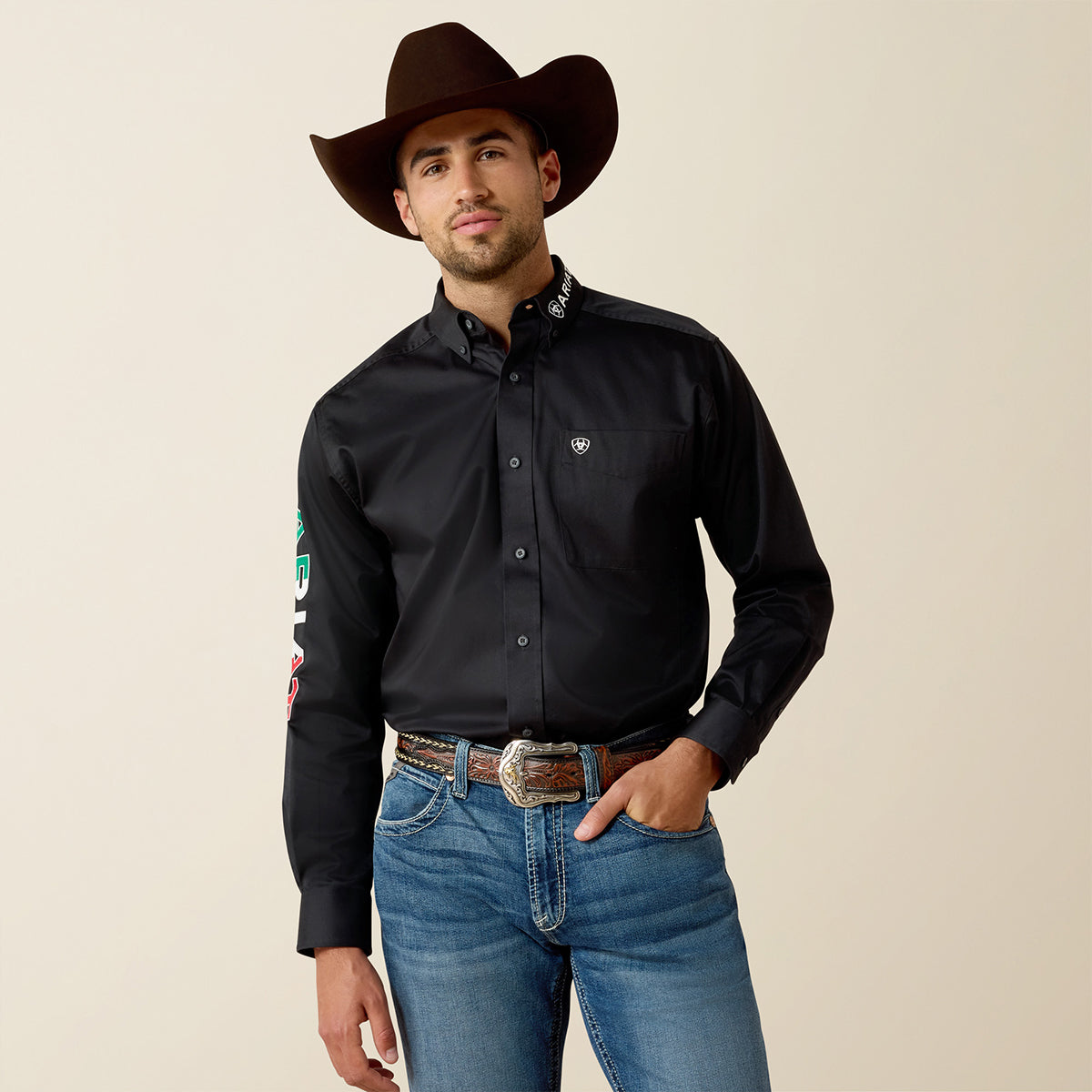 Front views of a man wearing the Ariat Men's Black Mexico Team Logo long sleeve twill shirt with tricolor sleeve embroidery.