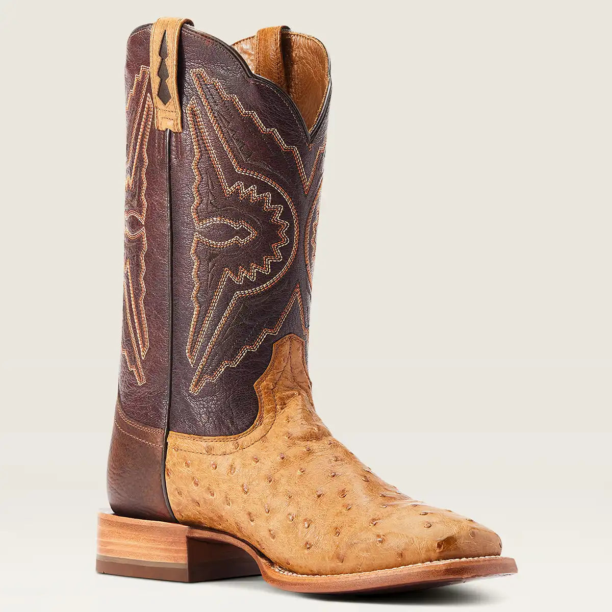 Ariat Men's Antique Saddle Western boot featuring a full-quill ostrich foot, bullhide heel counter, and dark brown embroidered shaft.