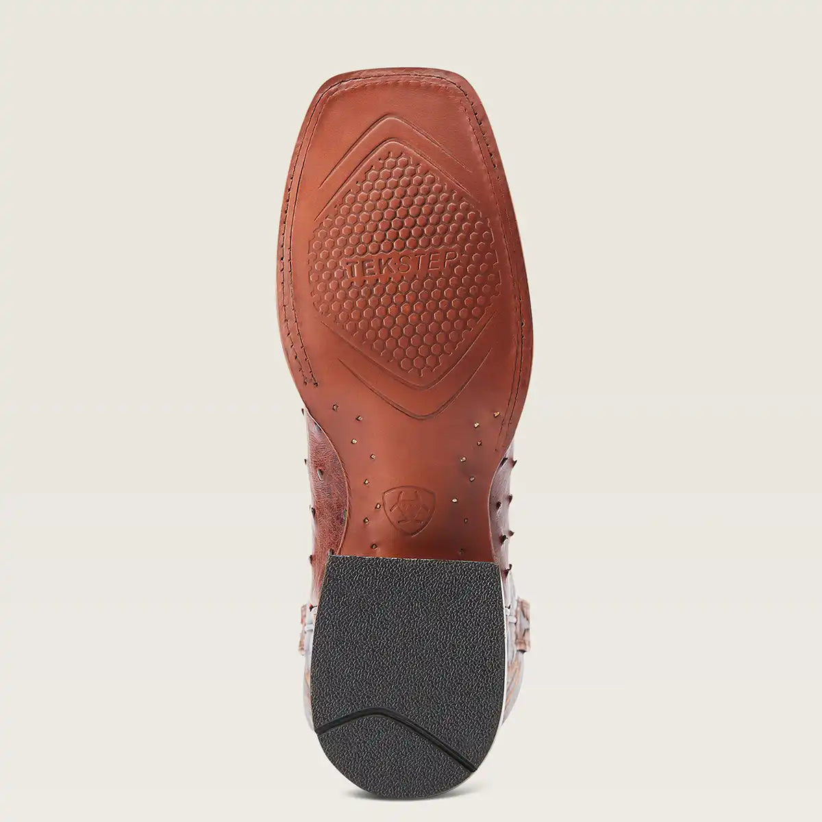The sole of a brown leather cowboy boot.