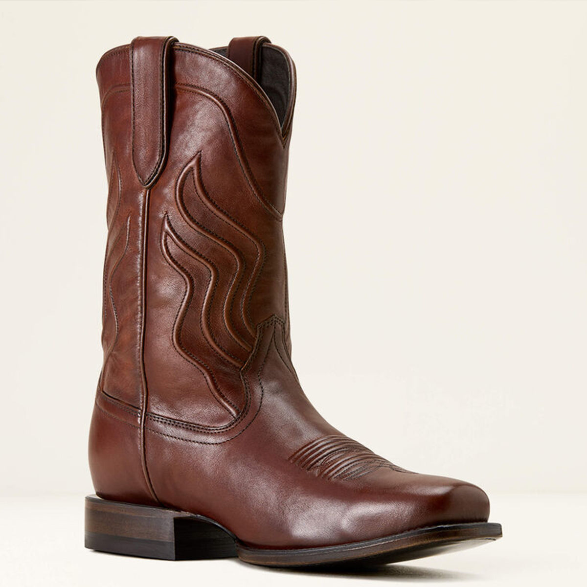 Ariat Ridge men's brown leather square toe cowboy boot on a beige background.