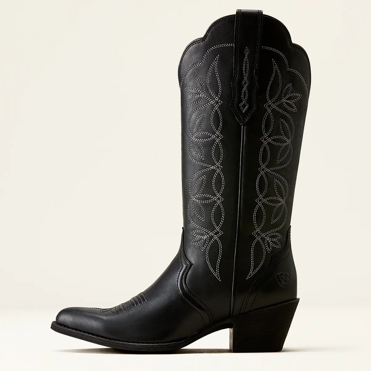 Full side profile view of the Ariat Heritage Blossom Western boot highlighting the 2-inch New West heel, J-toe, and scalloped top collar shape.