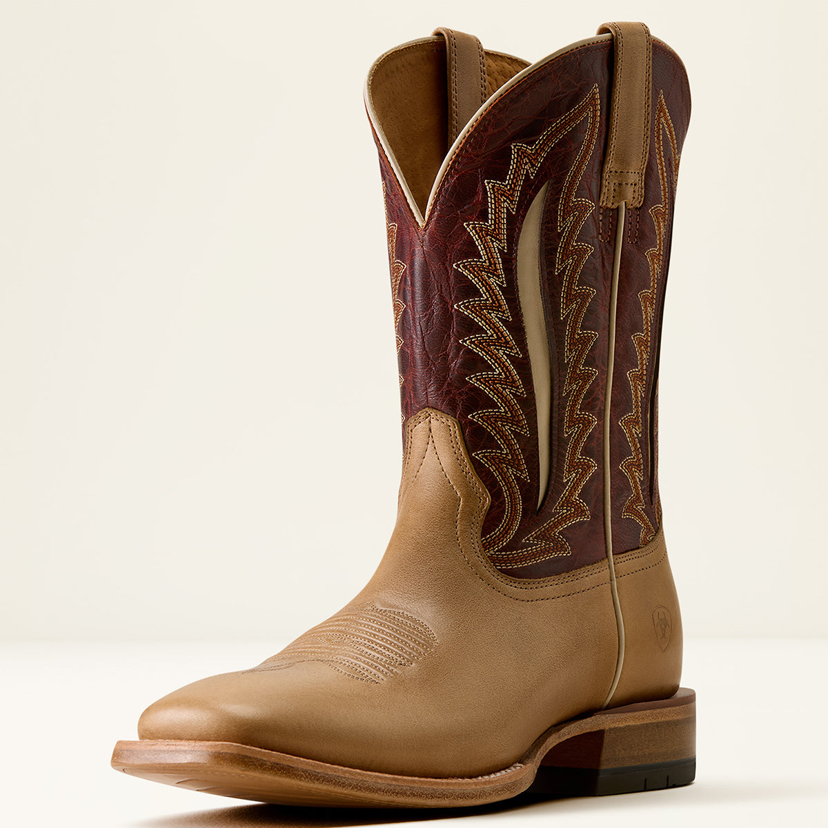 Ariat Men’s Gage Wide Square Toe Western Boot in Faded Carmel leather with a Fired Brick upper shaft featuring six-row stitching and cream inlay details.