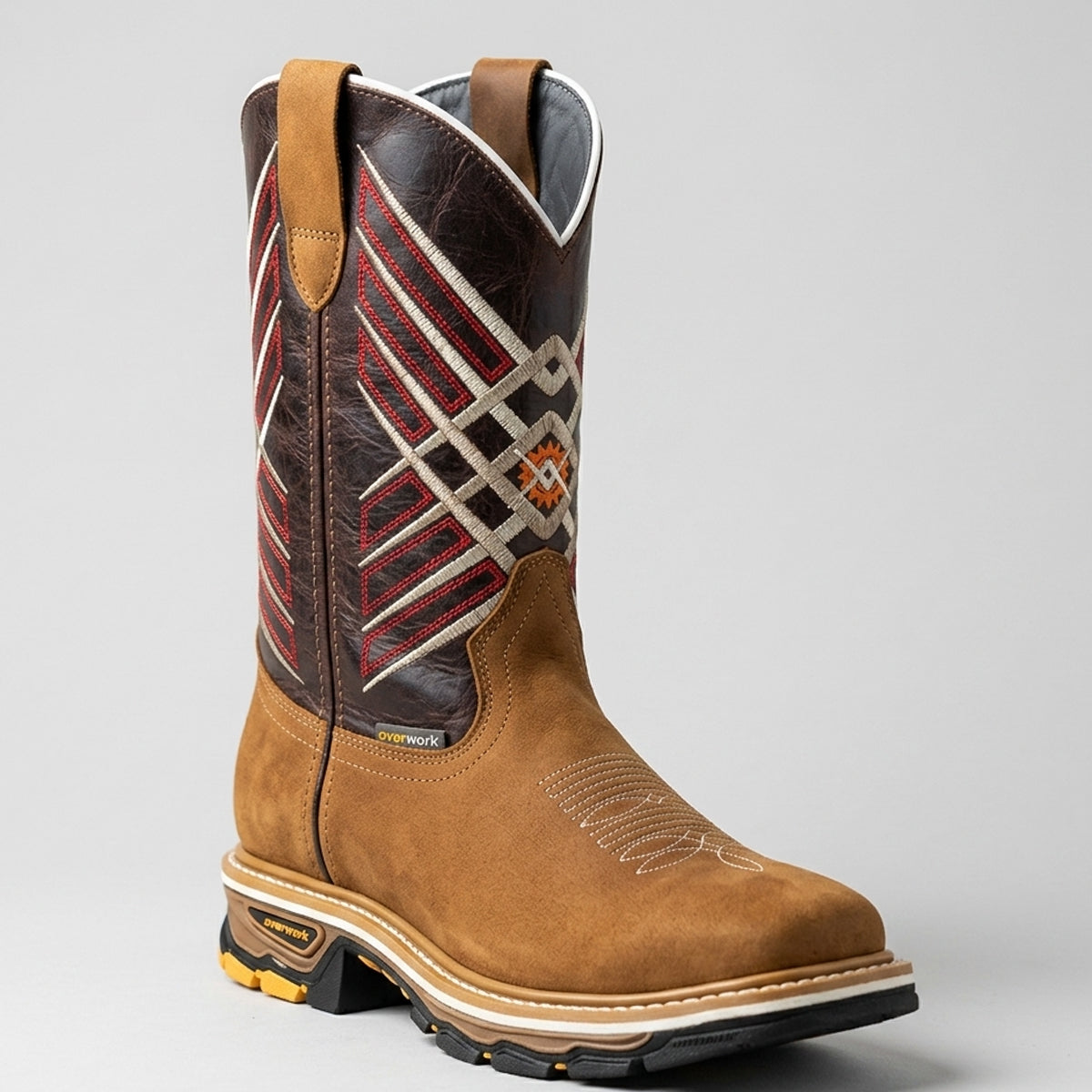 Overwork men's pull-on work boots in honey brown and dark brown leather featuring native-style geometric embroidery on the shaft and a square toe.