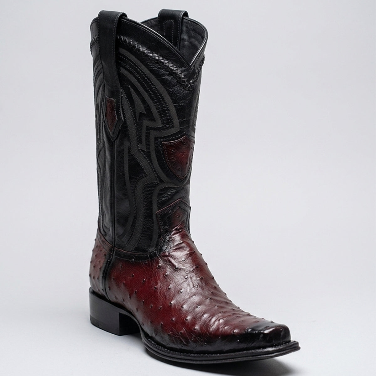 Wild West men's western cowboy boot with a black leather shaft and a reddish-brown full quill ostrich leather, shown on a light gray background.