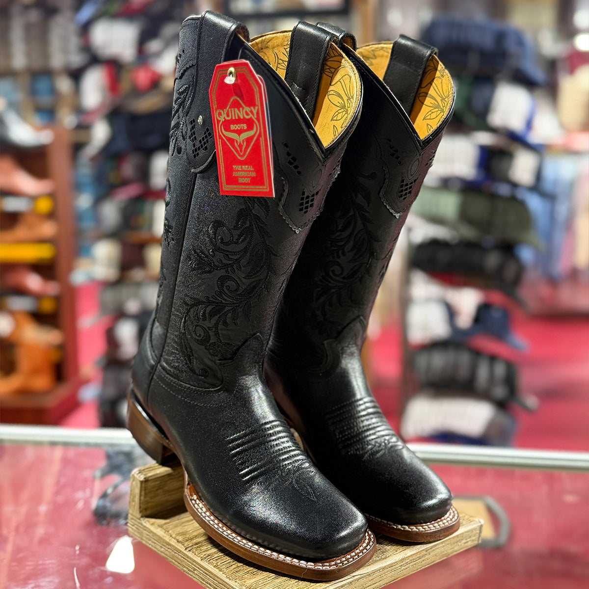 Quincy black floral embroidered square toe cowgirl boots.