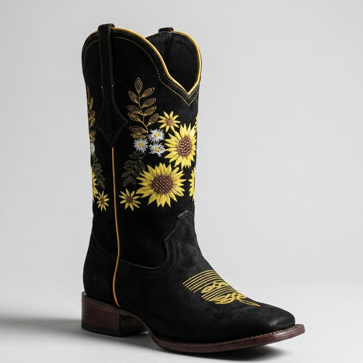 White Diamonds women's black nubuck leather square toe boot with yellow sunflowers embroidery on shaft.