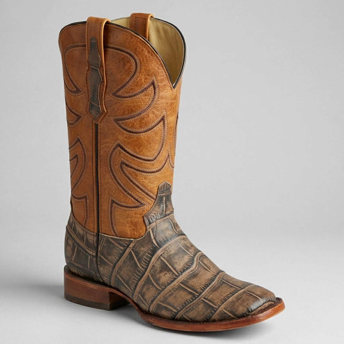 El General men's Alligator print brown square toe cowboy boot on a gray background.