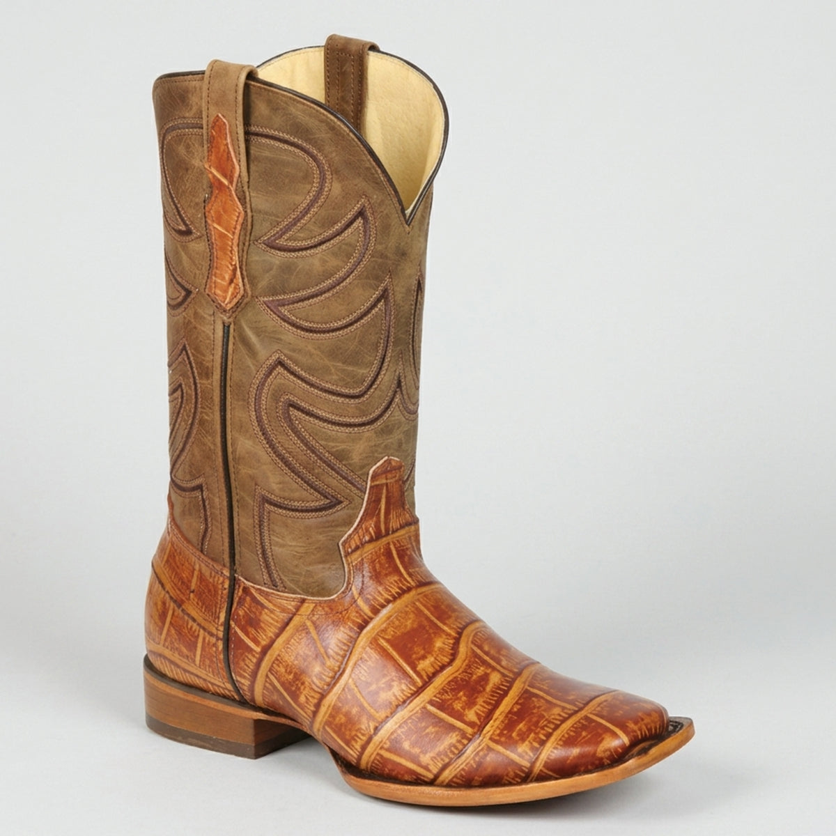 El General men's light brown square toe cowboy boot with Alligator print design on a light gray background.