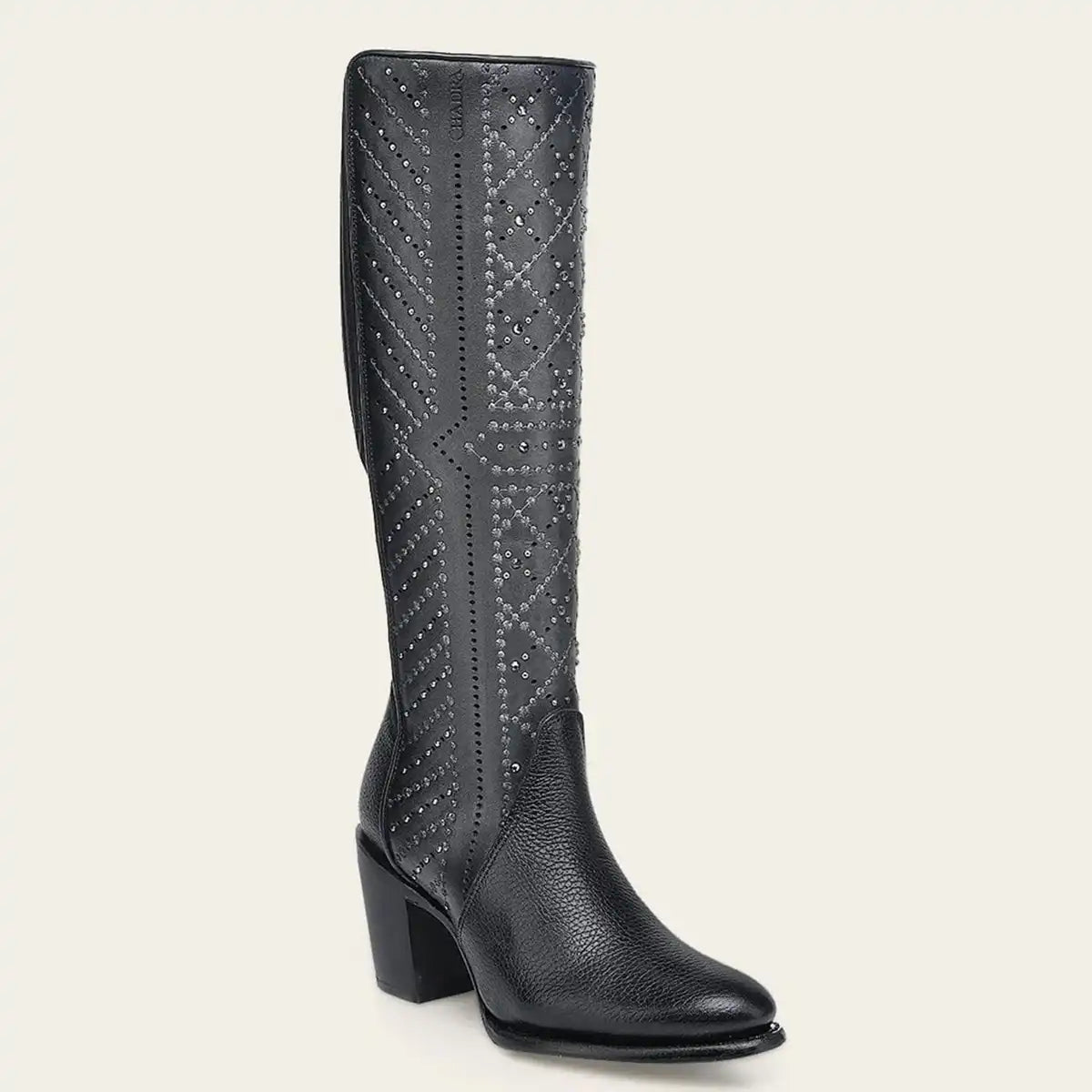 Front profile view of the Cuadra Women's black bovine leather tall boot highlighting geometric laser perforations and Swarovski crystal details.