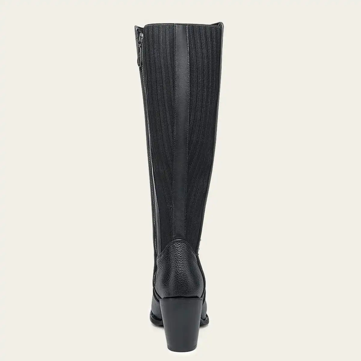 A Cuadra women's black knee-high leather boot with a vertical ribbed texture and a block heel, shown from the back on a light beige background.