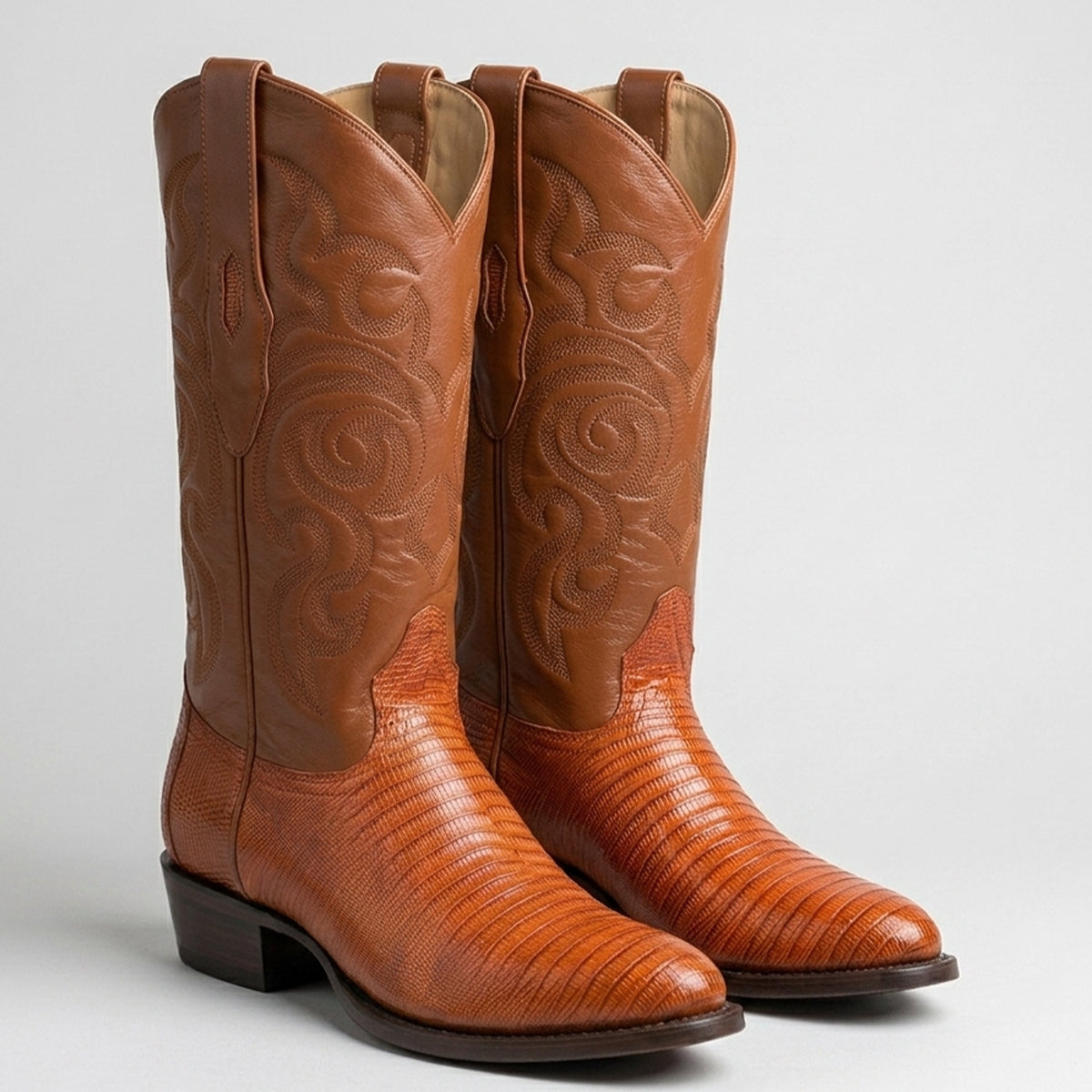 Pair of Los Altos Men's exotic cognac lizard skin western boots with a classic round toe and matching embroidered leather shaft.