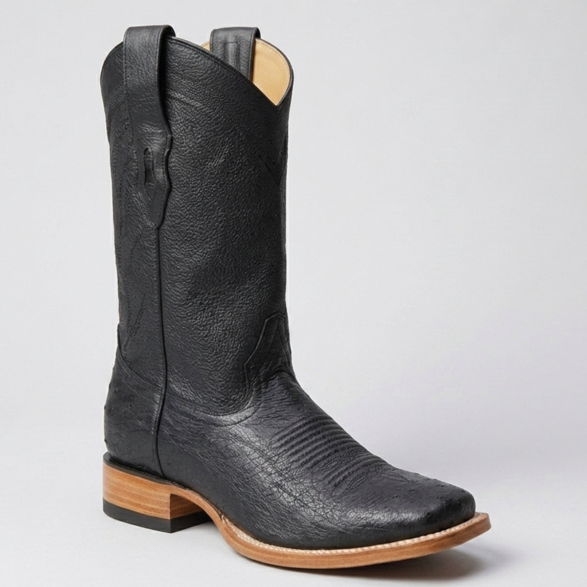 Los Altos Men's black smooth ostrich belly leather cowboy boots featuring a wide square toe, deep natural creases, 11-inch shaft, and stacked leather heel.