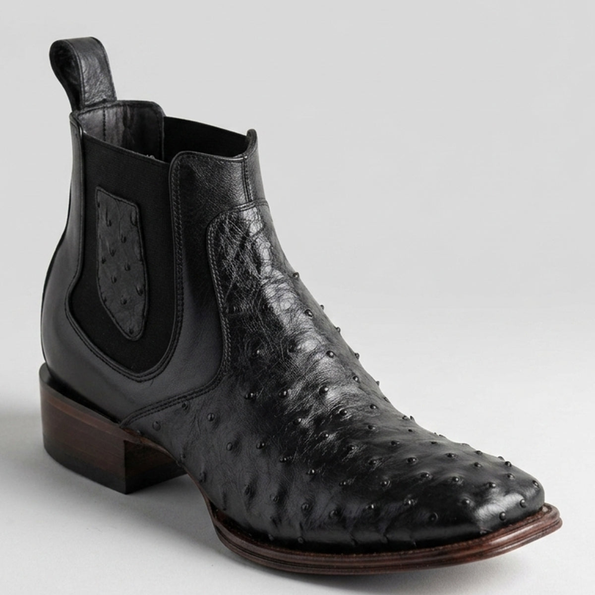 Los Altos men's black genuine full quill ostrich leather Chelsea ankle bootsfeaturing a square toe, black elastic side goring, and a leather pull tab.
