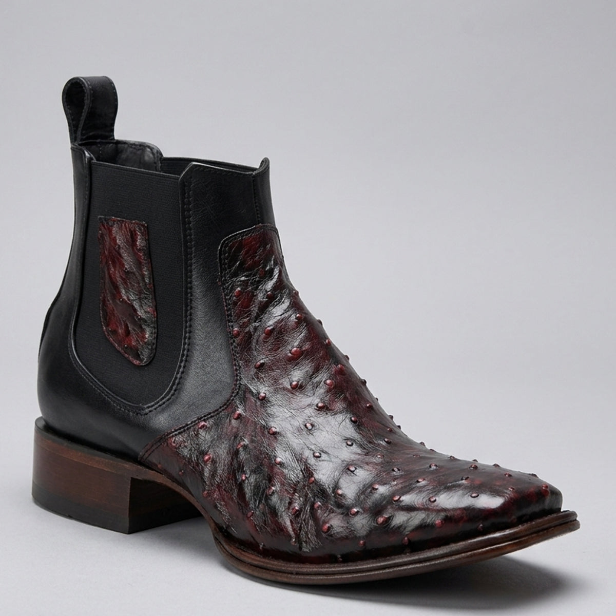 Los Altos men's Chelsea ankle boot featuring a deep black cherry full quill ostrich leather foot, smooth black leather shaft, and a modern square toe.