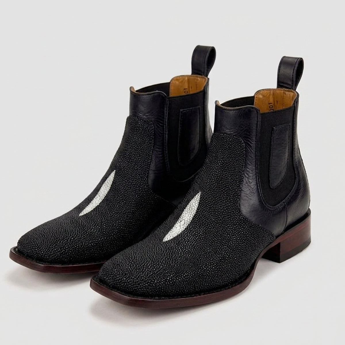 Los Altos men's black genuine stingray leather Chelsea ankle western boots featuring a textured pearl finish, a distinctive white diamond eye mark, and a square toe.
