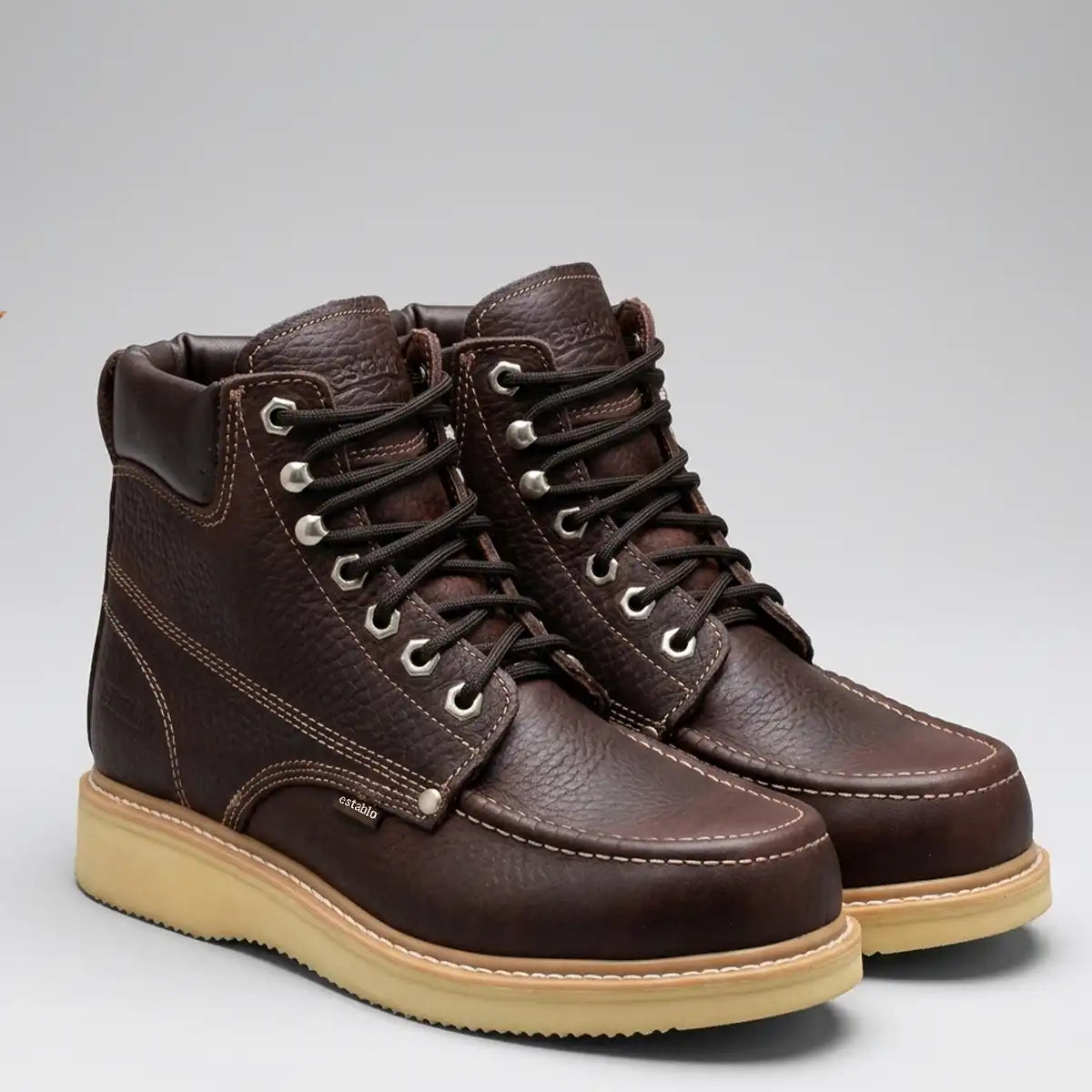 Pair of Establo Men's dark brown leather steel toe moc toe work boots displayed on a light background.