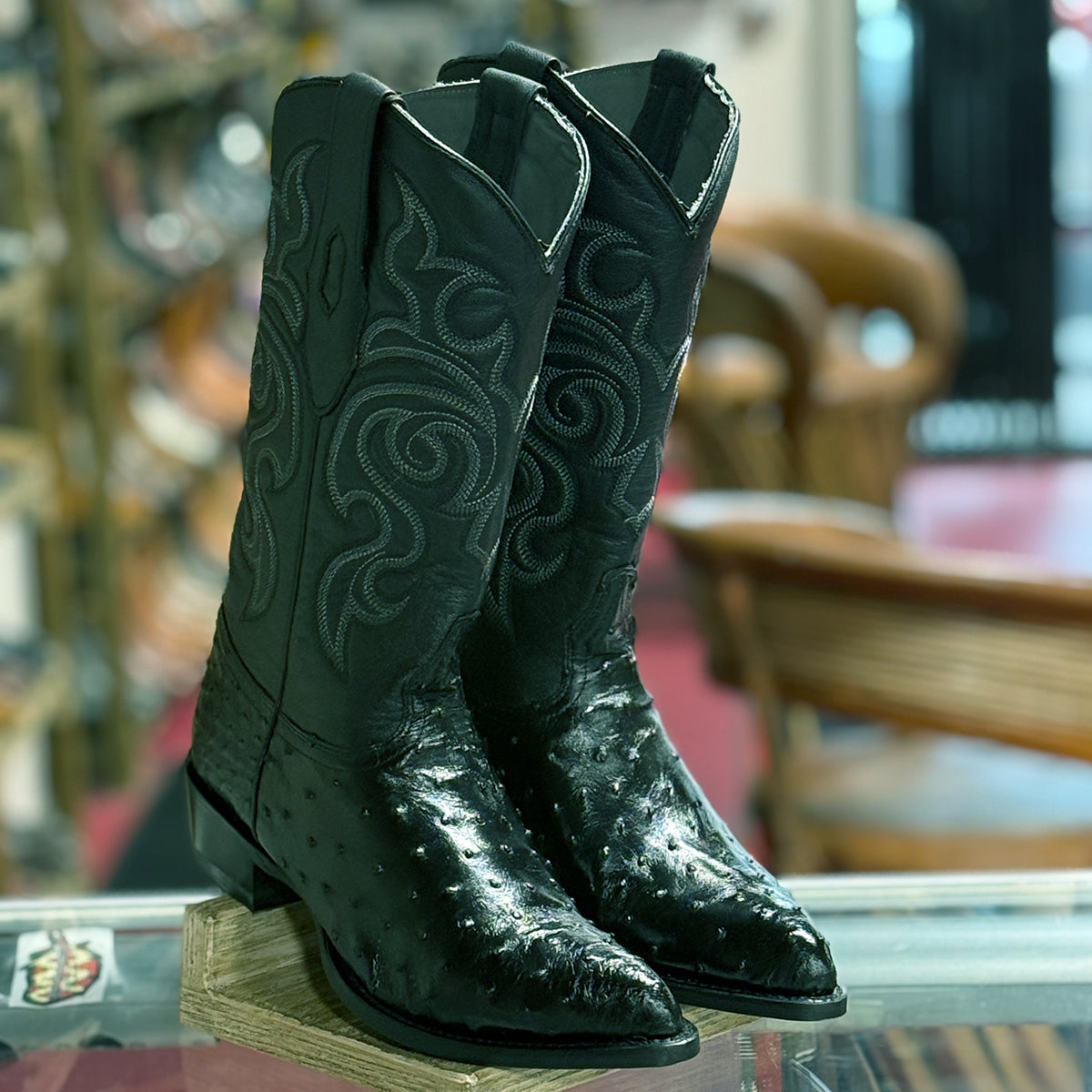 Black ostrich cowboy boots