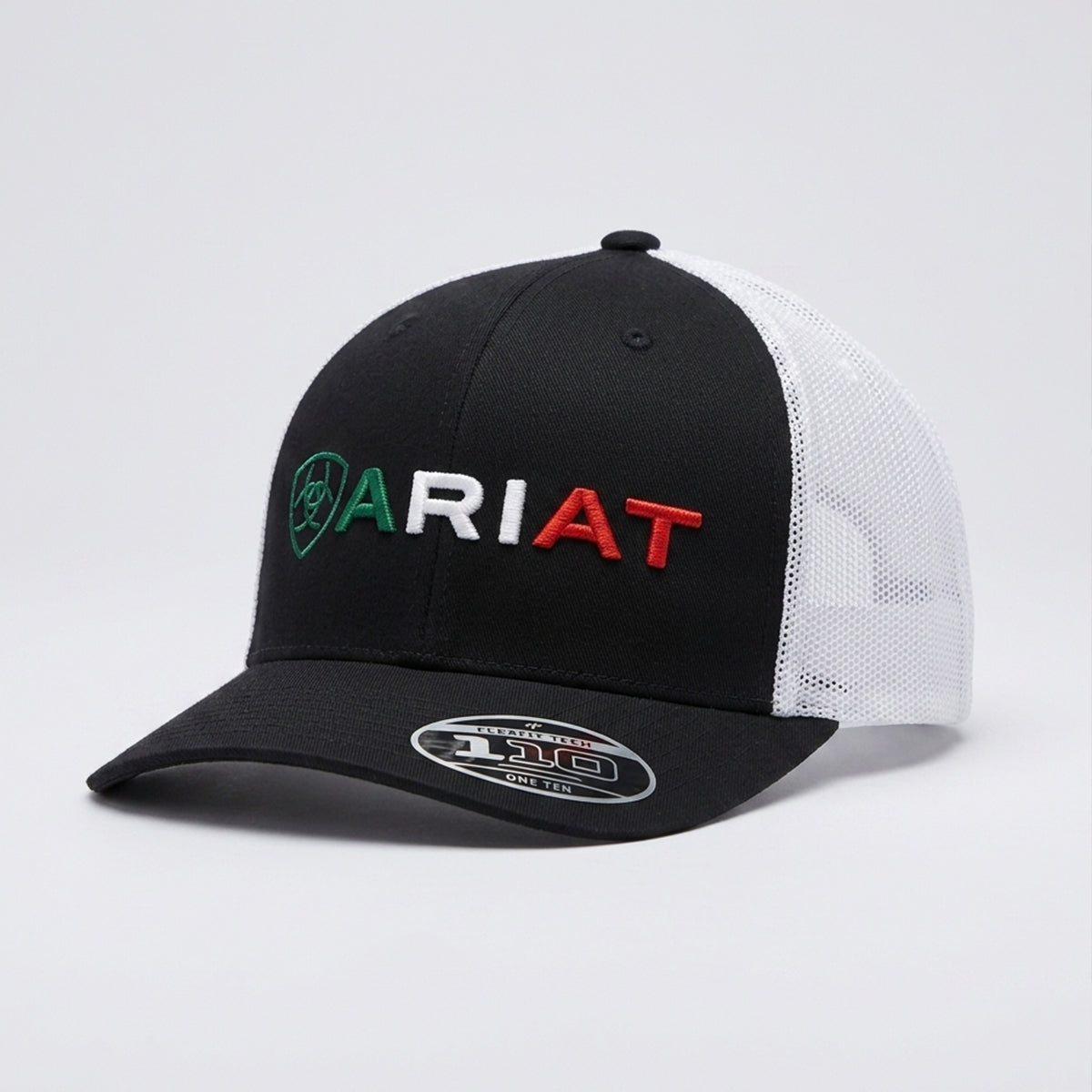 Ariat youth black trucker hat featuring the Ariat name and shield logo embroidered in green, white, and red with a white mesh snapback.