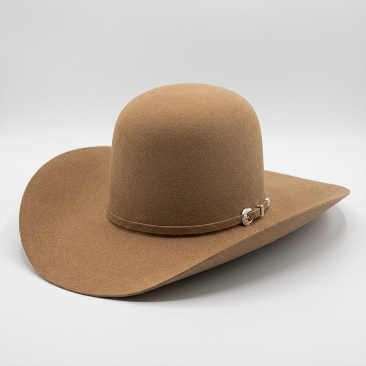 American Hat Co 7X Tuscan brown open crown felt cowboy hat with a decorative band on a white background.