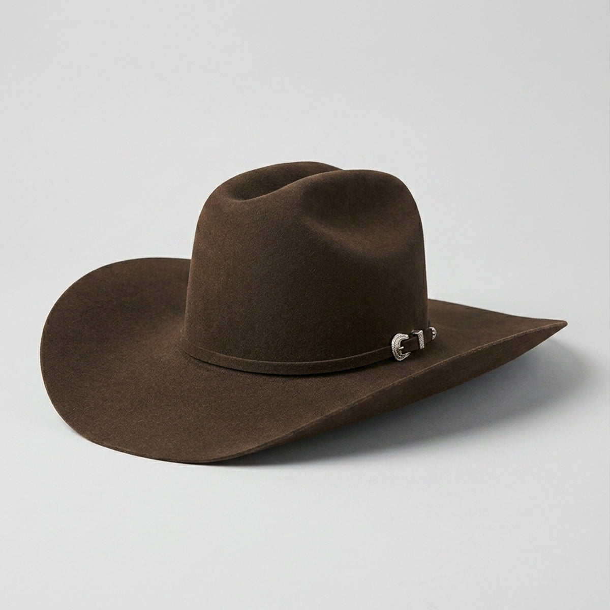 American Hat Company brown felt cowboy hat with a silver buckle on a light gray background.