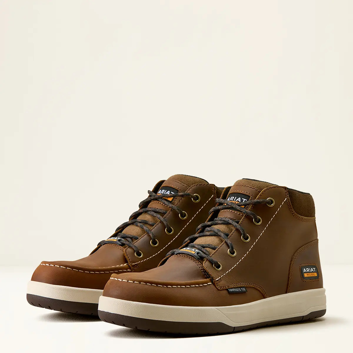 Pair view of the Ariat Men's Outmatch Mid work shoes displaying the mid-top silhouette, eyelets, and durable construction.