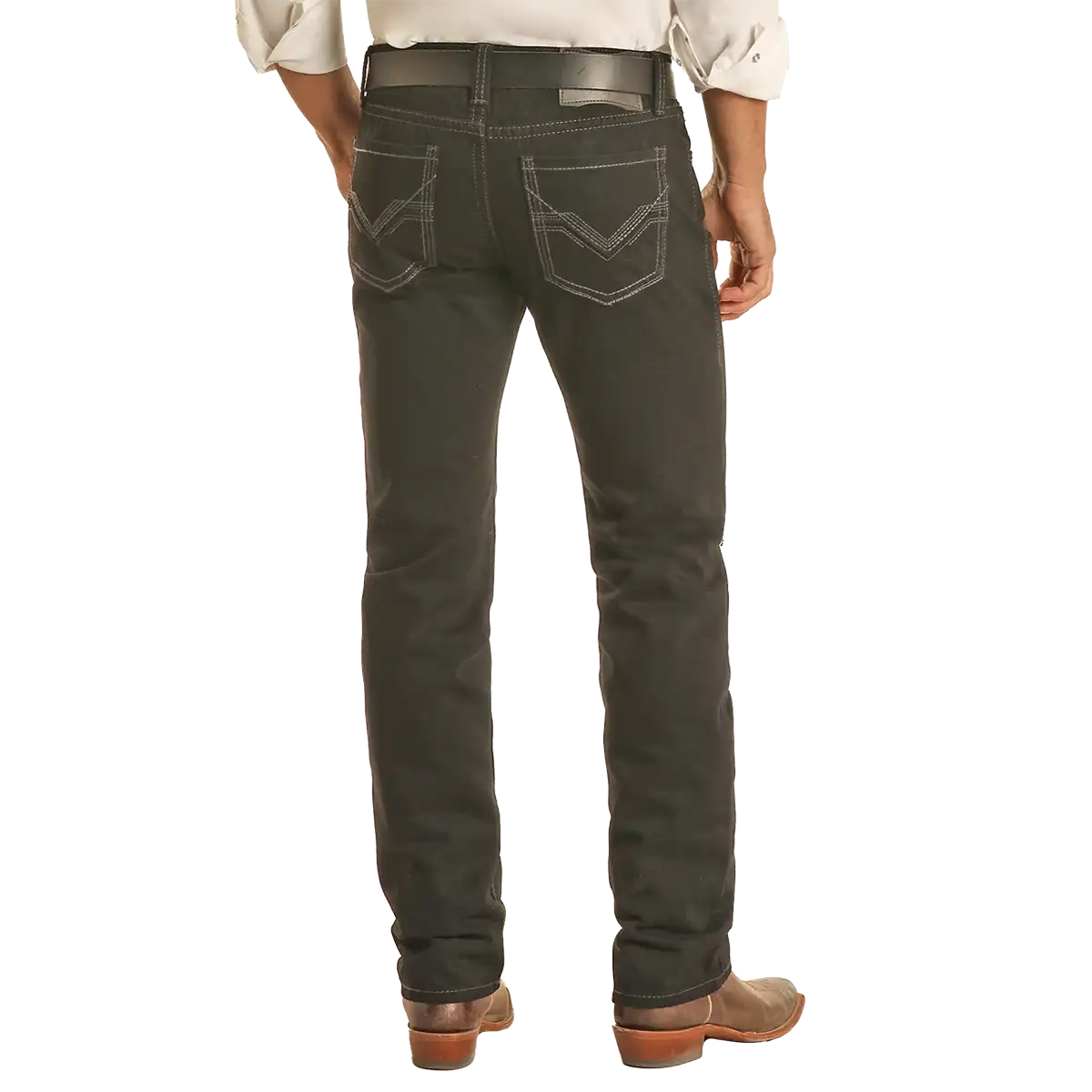Studio back view of a man wearing Rock & Roll Denim Revolver black slim straight jeans with Western belt and boots.