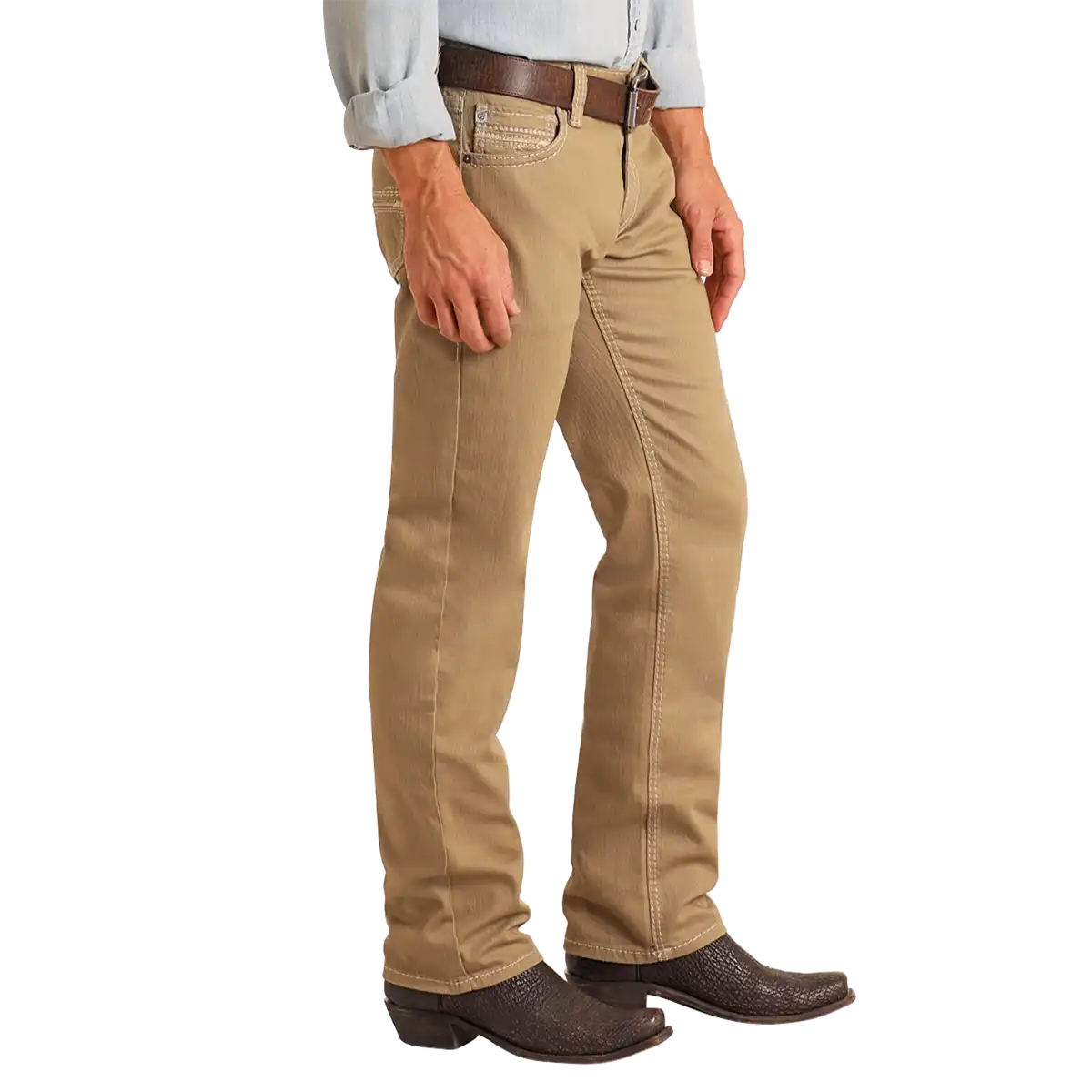 View of a man wearing Rock & Roll Denim Revolver Khaki slim straight jeans with Western boots and belt.