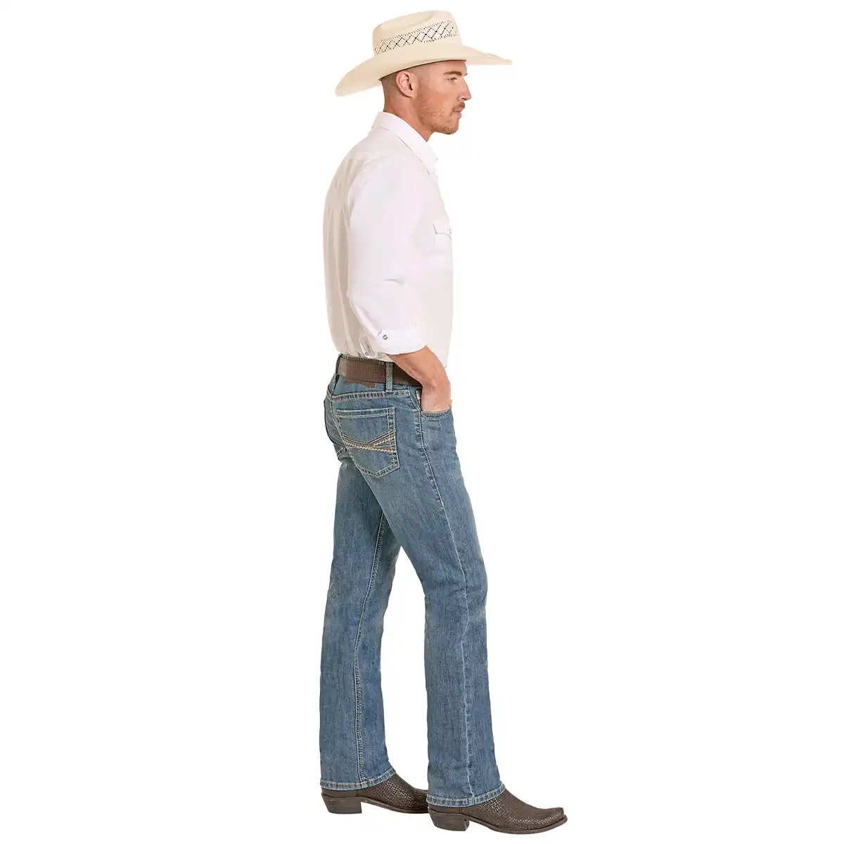 A man shown in profile wearing a white long-sleeve button-up shirt, blue jeans, brown boots, and a light beige cowboy hat against a plain white background.