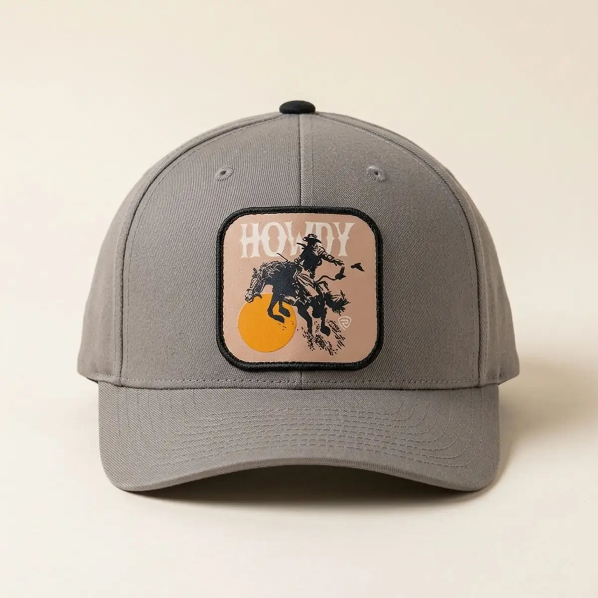 Straight-on front view of the Rock & Roll Denim grey 6-panel cap detailing the embroidered square Howdy patch and black button top.