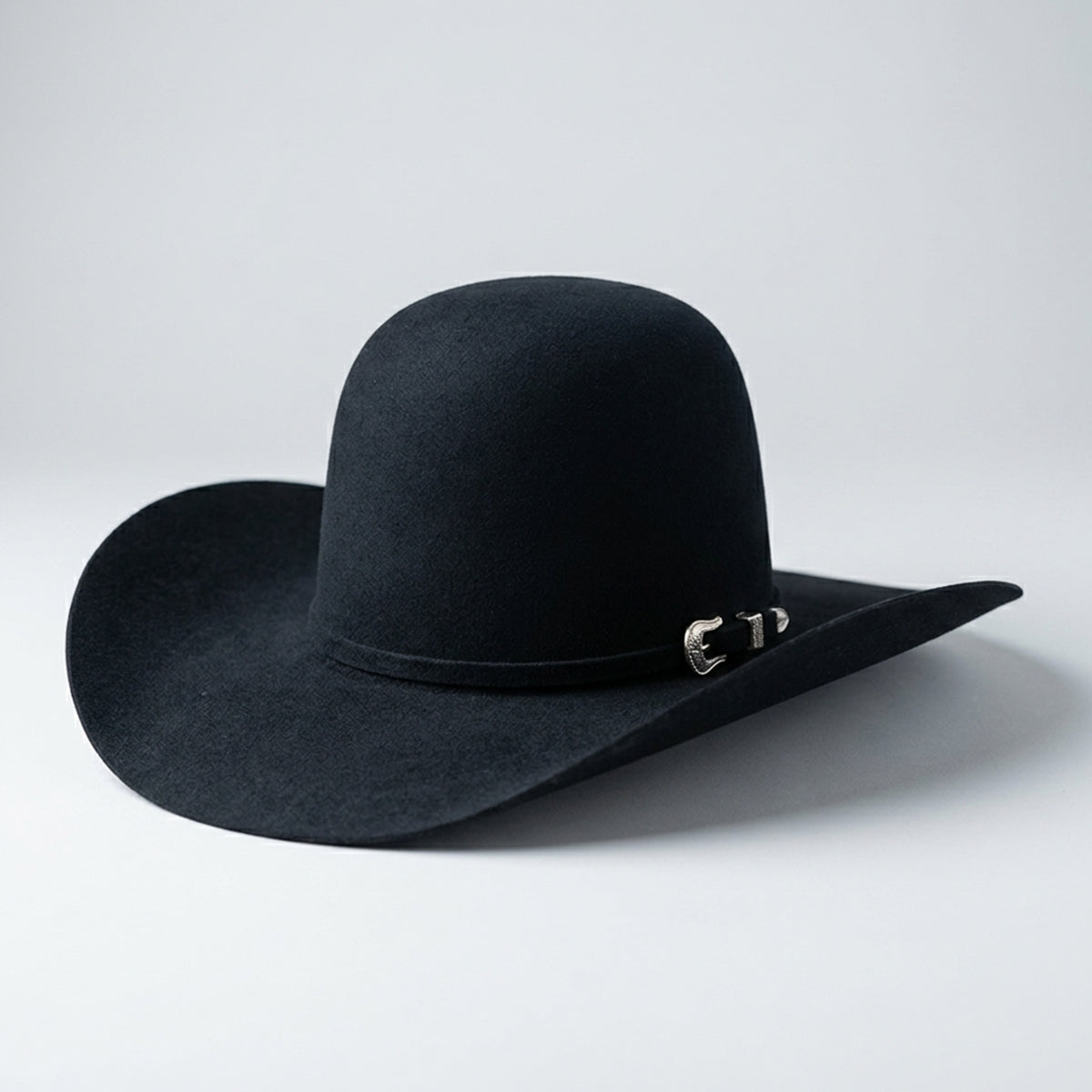 American Hat Co blue felt cowboy hat with a silver buckle on a white background.