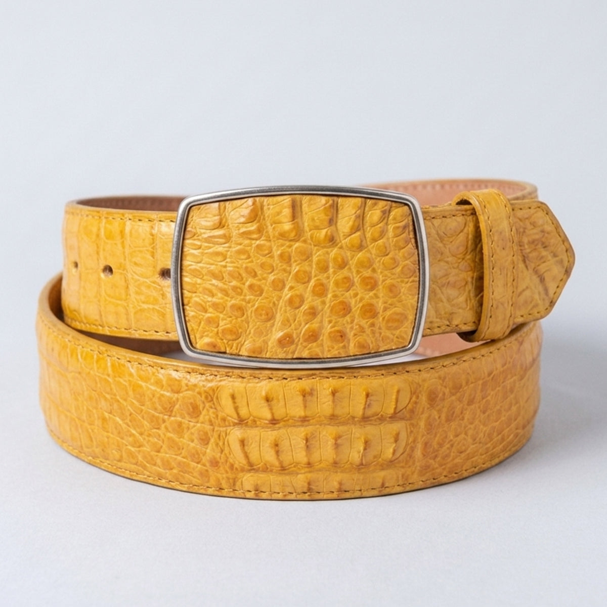 Los Altos men's buttercup yellow genuine caiman hornback leather belt with a silver-framed rectangular buckle featuring a matching raised hornback scale inlay.