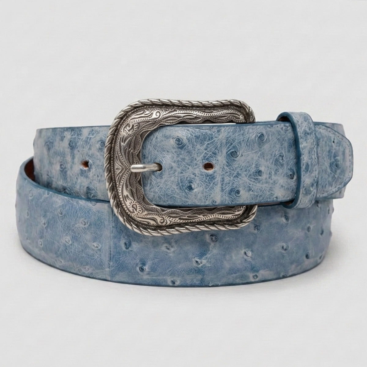 Los Altos men's light blue ostrich leather belt with a silver-tone western heel-bar buckle, coiled on a light gray background.