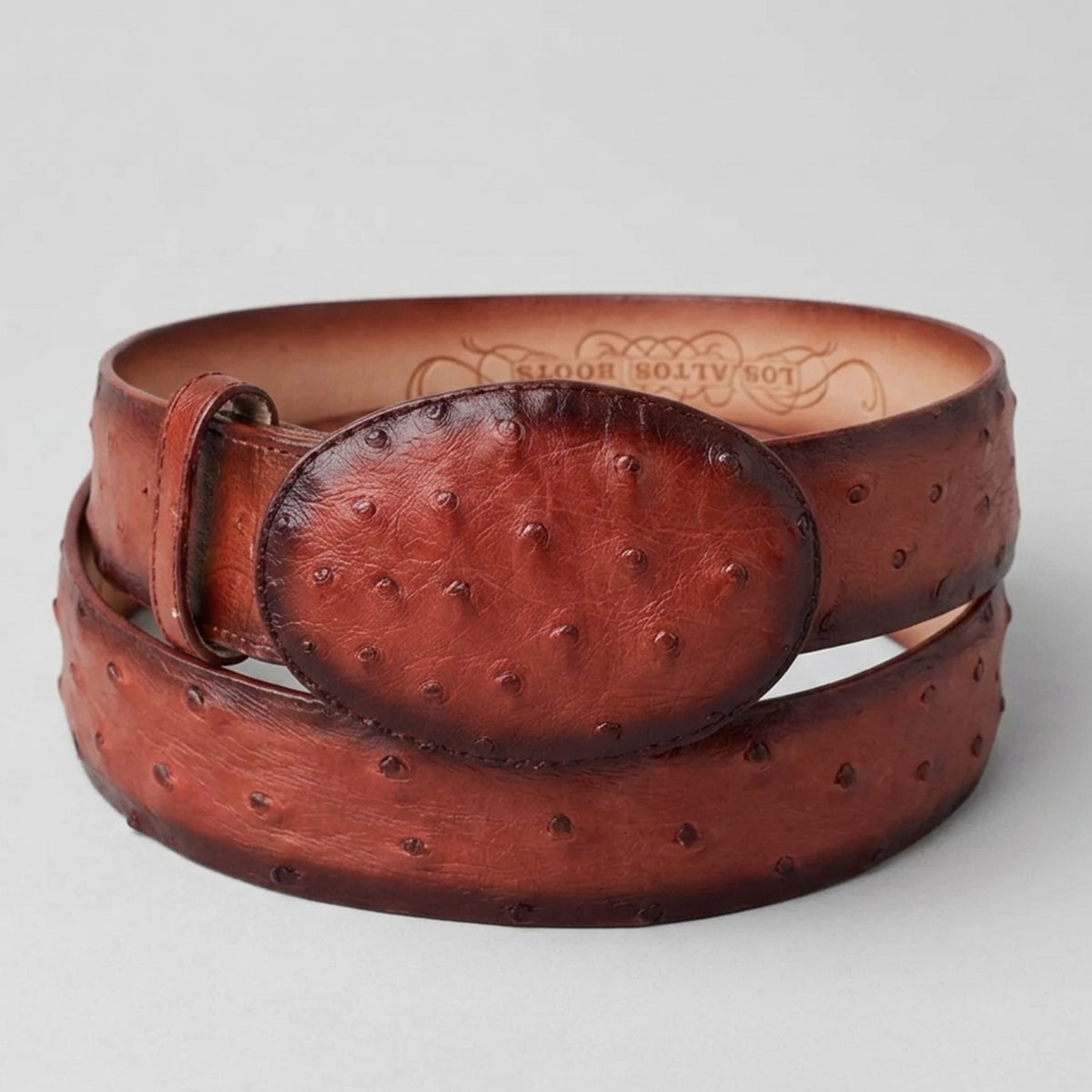 Los Altos men's burnished cognac brown genuine full quill ostrich leather western belt with a matching leather-inlay oval buckle.