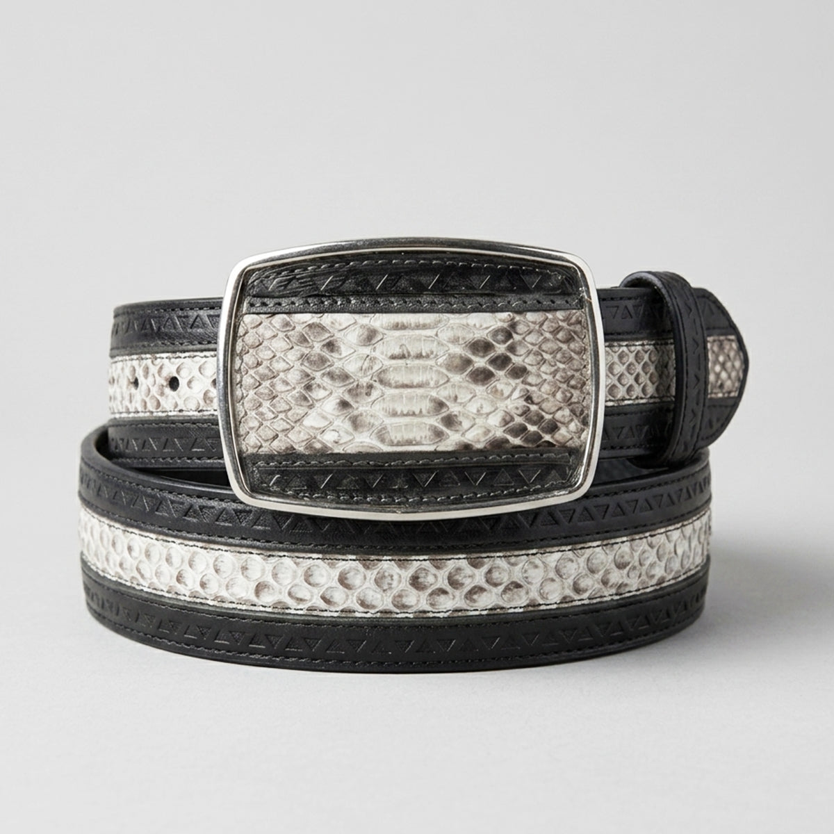 Los Altos Black and white python snakeskin belt with a silver buckle on a light gray background.