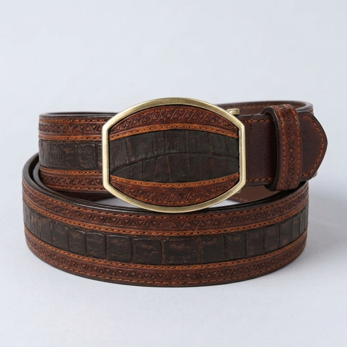 Los Altos men's sanded brown genuine caiman belly leather belt showing a dark chocolate scale center, warm brown laser-cut borders, and a matching brass-tone inlay buckle.
