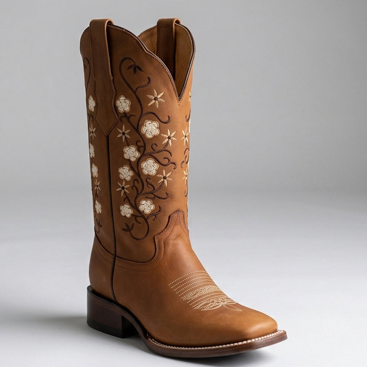 Botas Doble R Dalia women's tan leather square toe cowgirl boots decorated with ivory floral vine embroidery along the 11-inch upper shaft.