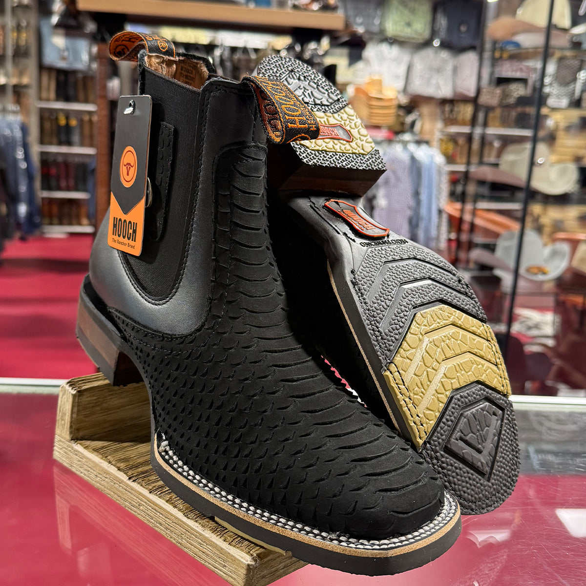 View of Matte Black Python Print Square Toe Boots with rubber outsole