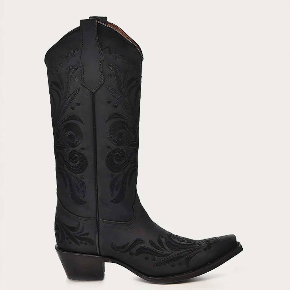 Side profile of Corral women's black cowboy boot with intricate designs on a light gray background.
