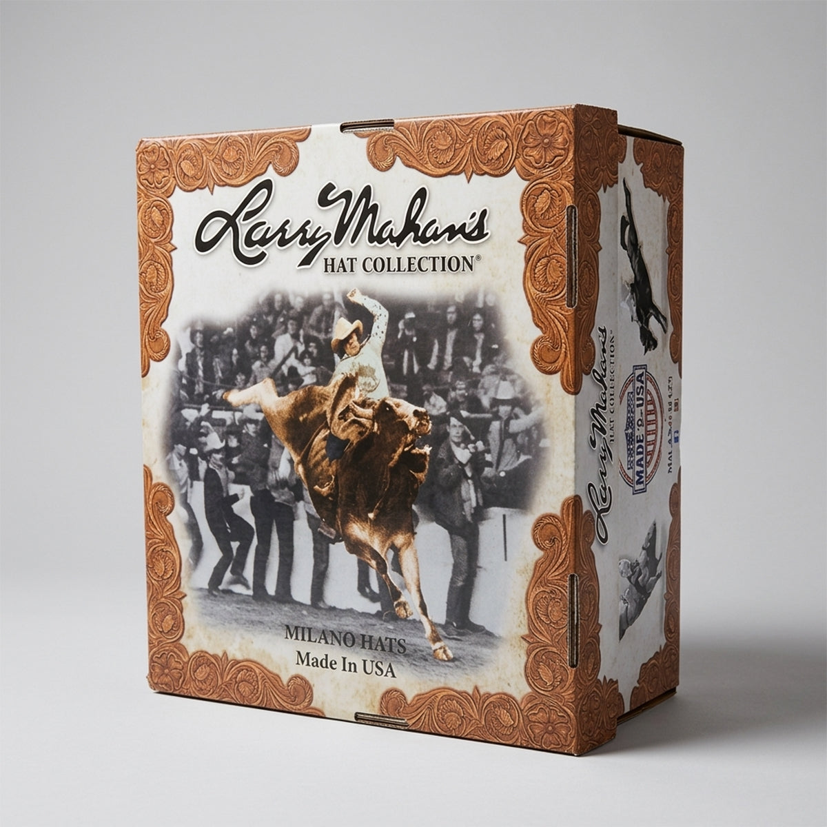 The iconic Larry Mahan Hat Collection cardboard box by Milano Hats, featuring a vintage sepia print of a cowboy riding a bucking bull and a tooled leather border design.