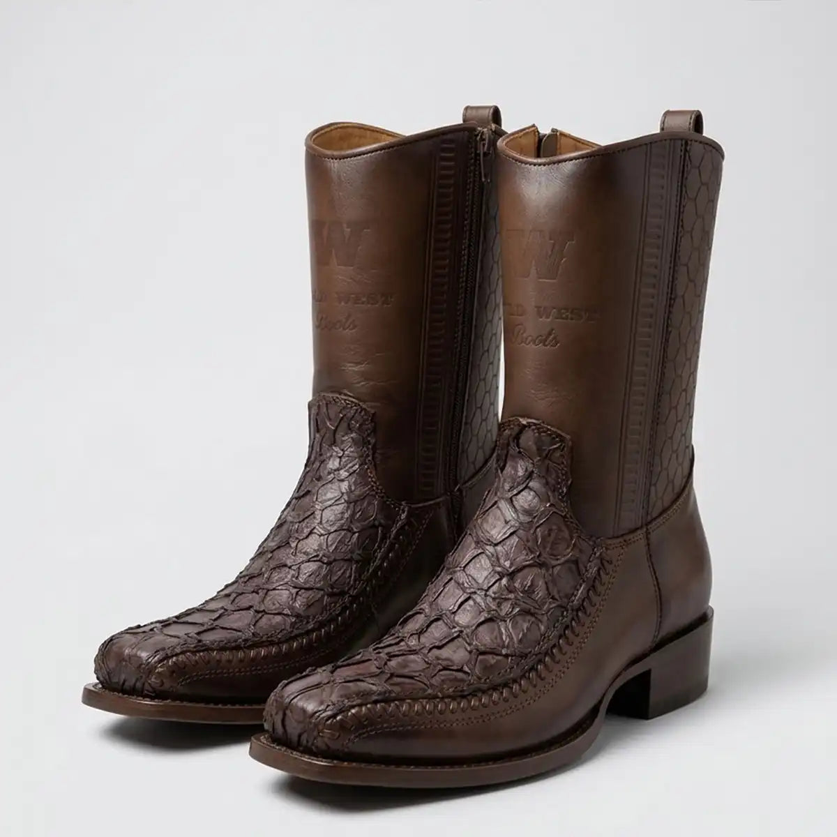 Three-quarter studio shot of the pair of Wild West men's faded tobacco pirarucu side-zip boots showing the 7X toe and braided welt.