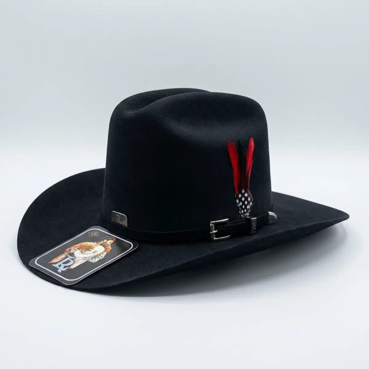 High-angle studio view of the black Luis R. Conriquez official tejana hat showing the multi-colored red, yellow, and green feather accent on the felt band.