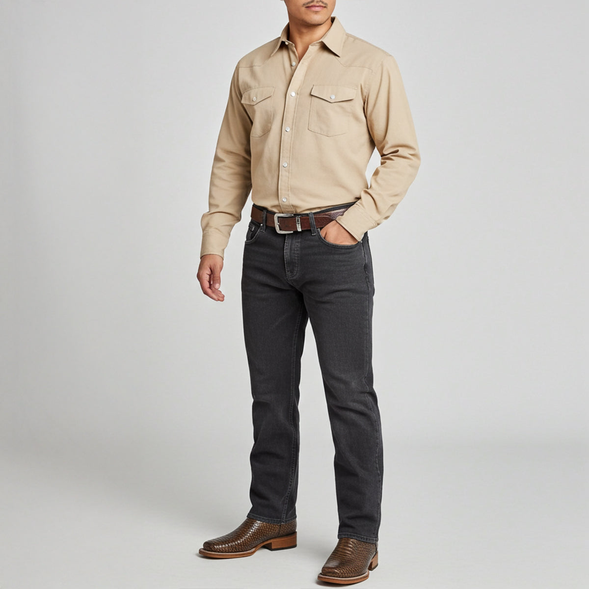 Man wearing brown snakeskin print square toe boots