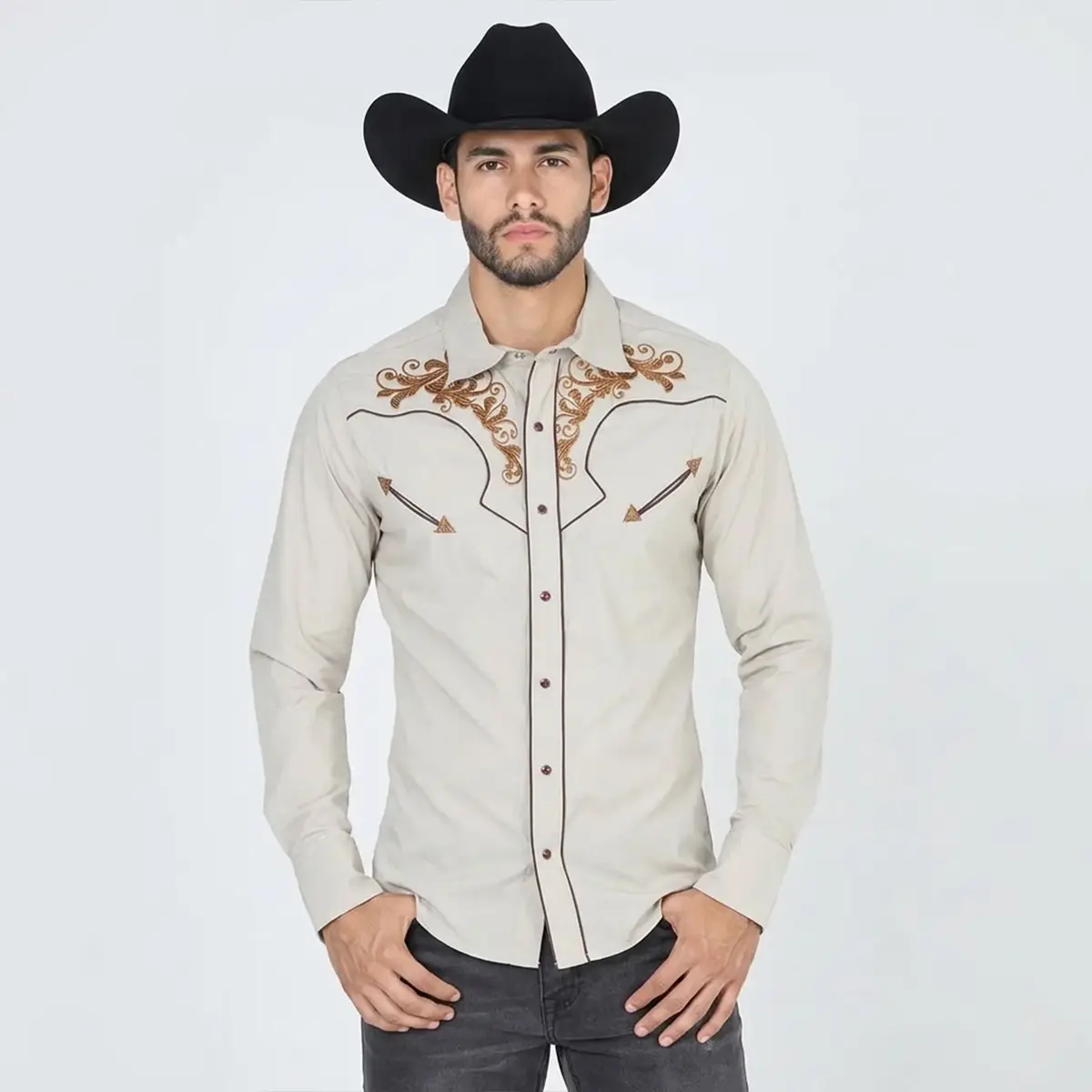 Studio front view of a man wearing El General Men's khaki long sleeve Western shirt with brown scroll embroidery, brown piping, and cowboy hat.