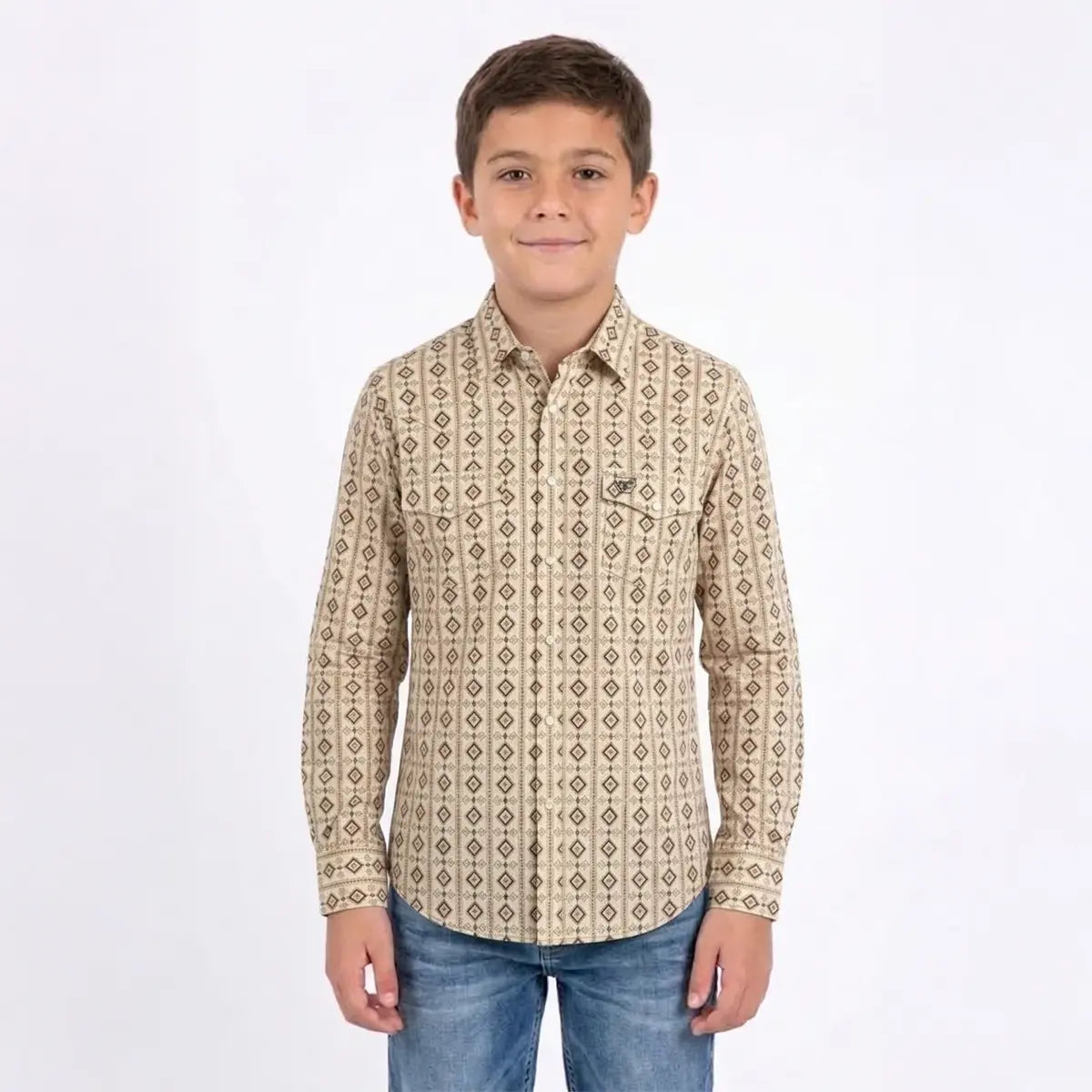 Front studio view of a young boy wearing the Platini Kids beige Aztec stripe Western snap shirt with blue jeans.