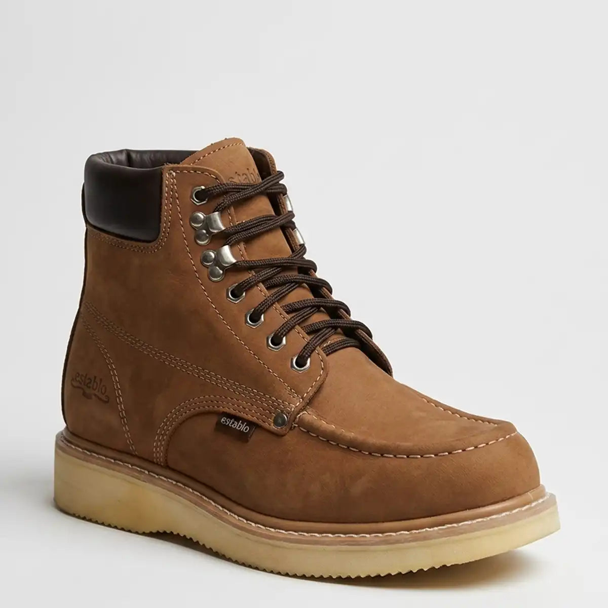 Studio side profile view of the Establo Men's 6-inch moc toe nubuck tan work boot showing the speed lace hooks and Goodyear welt.